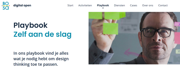 The Digital Open website containing the Playbook. This states that "In our playbook you will find everything you need to apply thinking by design". Alongside this, there is a photograph of a person busy brainstorming using Post-it notes.